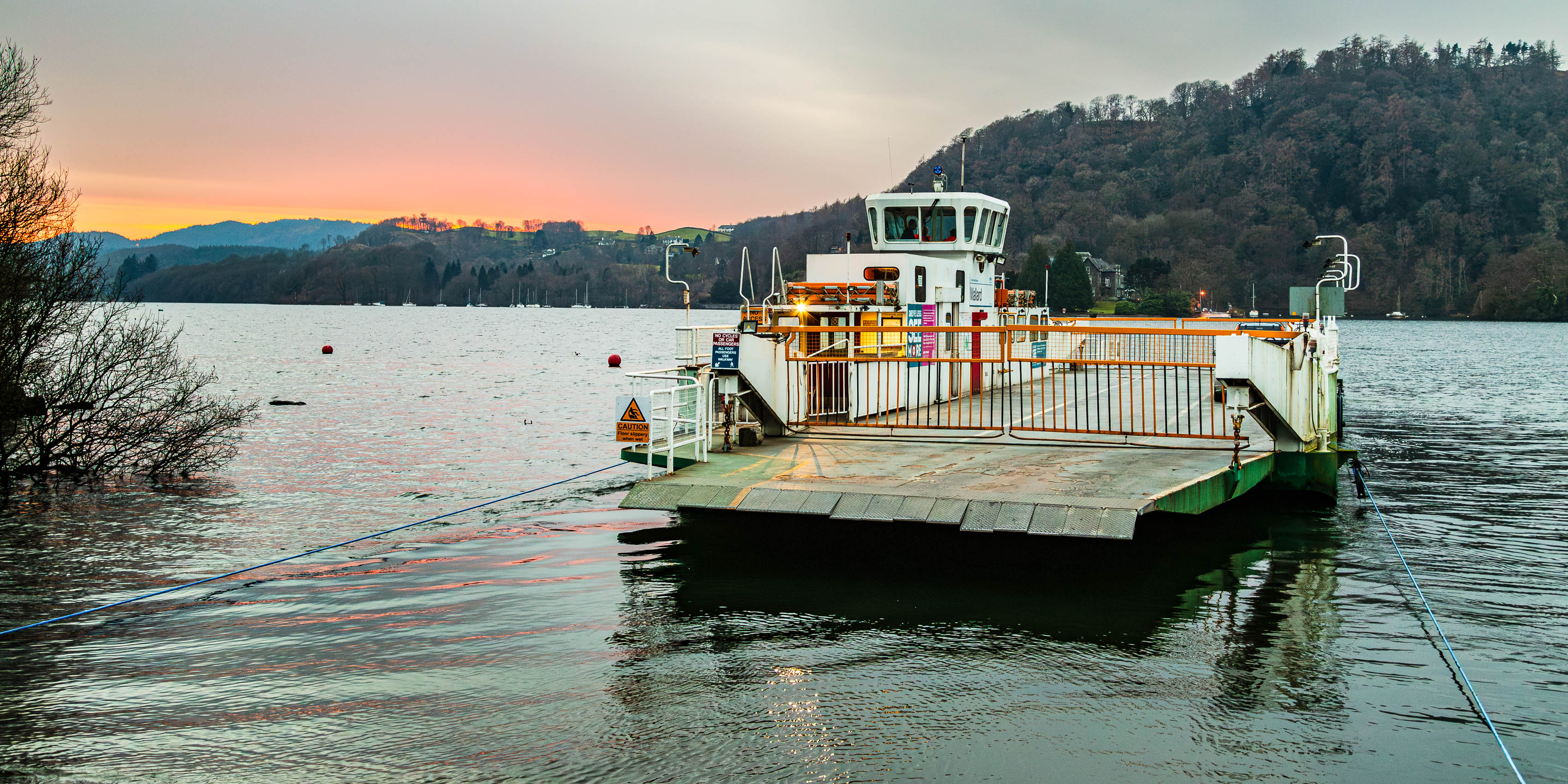 Windermere Ferry at dusk, Bowness, Cumbria, England. EL023