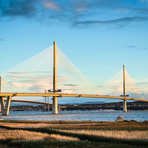 The Queensferry Crossing and Forth Road Bridge from near Rosyth, Fife, Scotland, United Kingdom. FB003