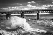 Monochrome (black and white) image of rough water on the Firth of Tay by the Tay Rail Bridge, Dundee, Scotland, United Kingdom. the Firth of Tay around the Tay Rail Bridge, Dundee, Scotland. DD027