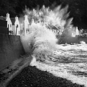 Wave breaking against the sea wall at Pennan on the Moray Coast, Scotland. SM025