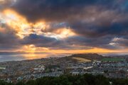 Light filtering through clouds over the Tay Estuary from Dundee Law, Dundee, Scotland. DD035