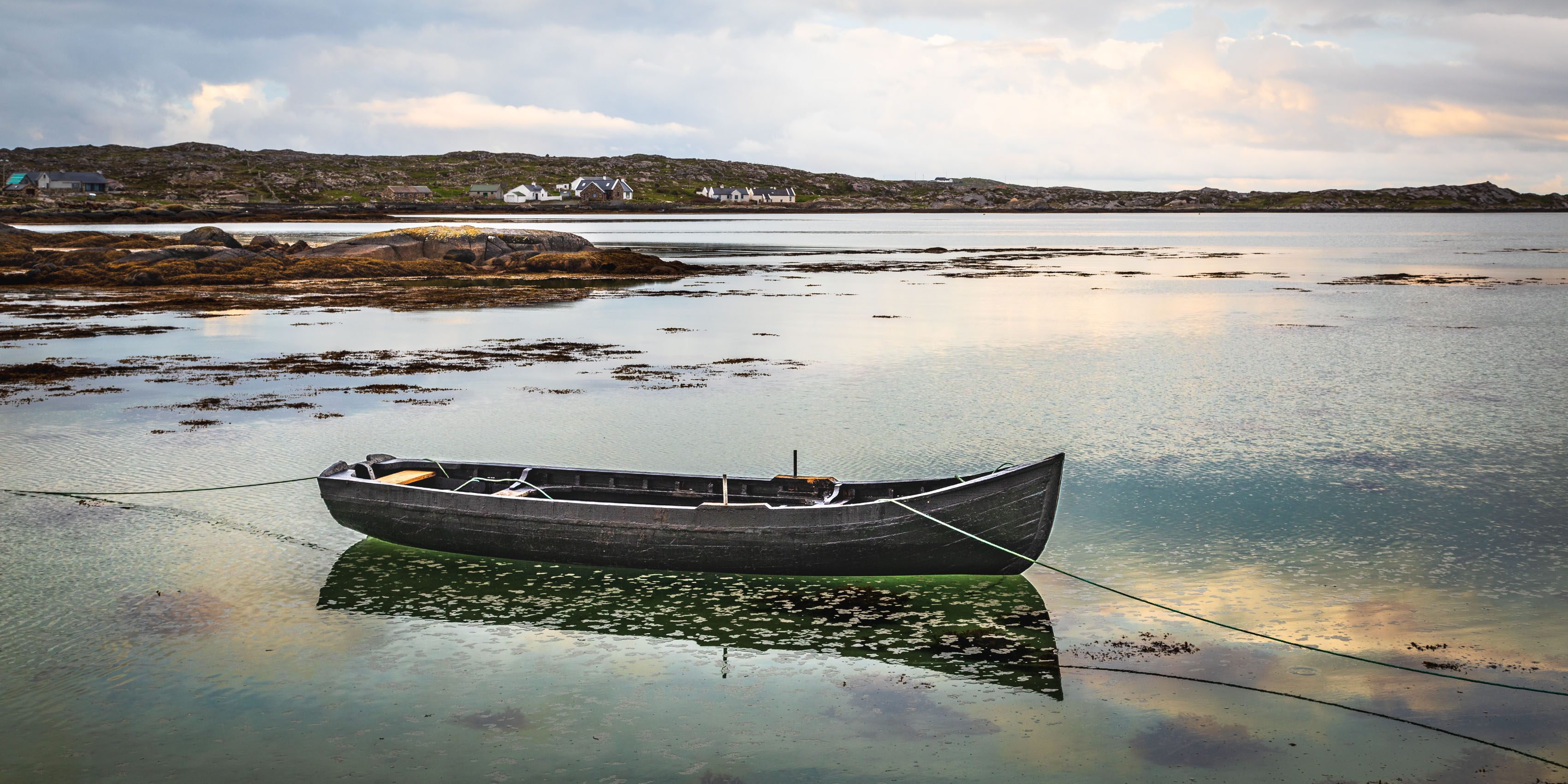 Boat in Doonloughan Bay, Connemara, County Galway.