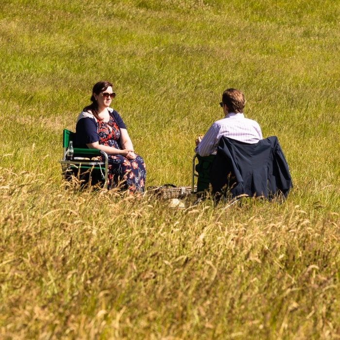 Couple picnicking on Magdalen Green during the Covid-19 pandemic, Dundee, Scotland