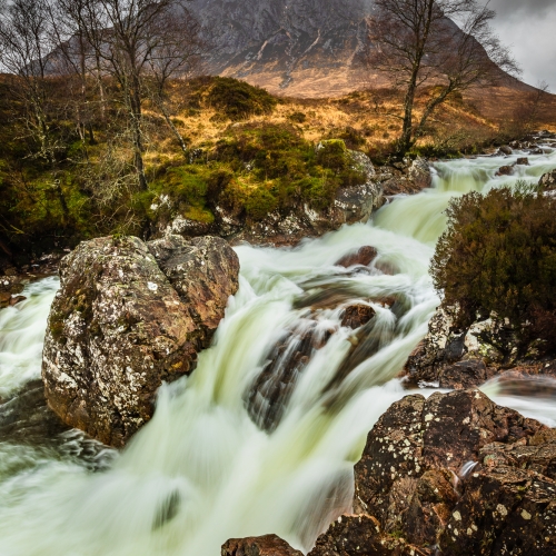 Buachaille Etive Mor and the Coupall Falls in spate, Glen Etive, Scotland.