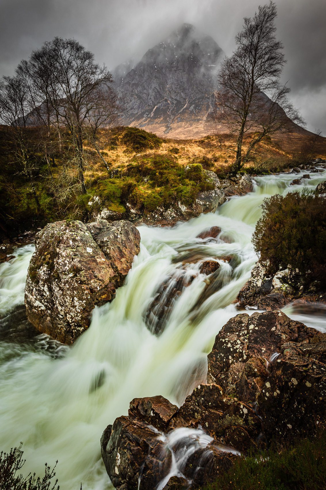 Buachaille Etive Mor and the Coupall Falls in spate, Glen Etive, Scotland.