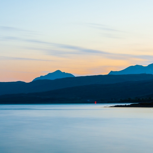 Dusk behind the Torridon mountains from Loch a' Chroisg, Wester Ross, Scotland.