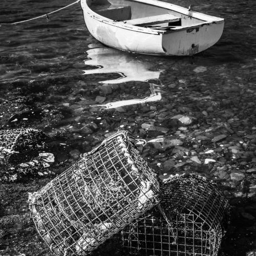 Moored boat and lobster pots, Connemara, Ireland. IM002