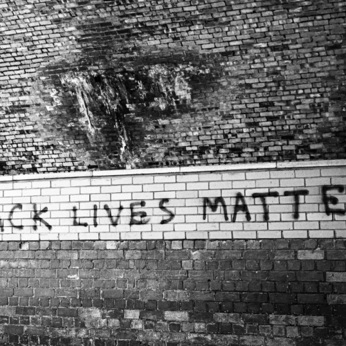 Slogan painted under the Tay Rail Bridge, Wormit, Fife, Scotland. SM058