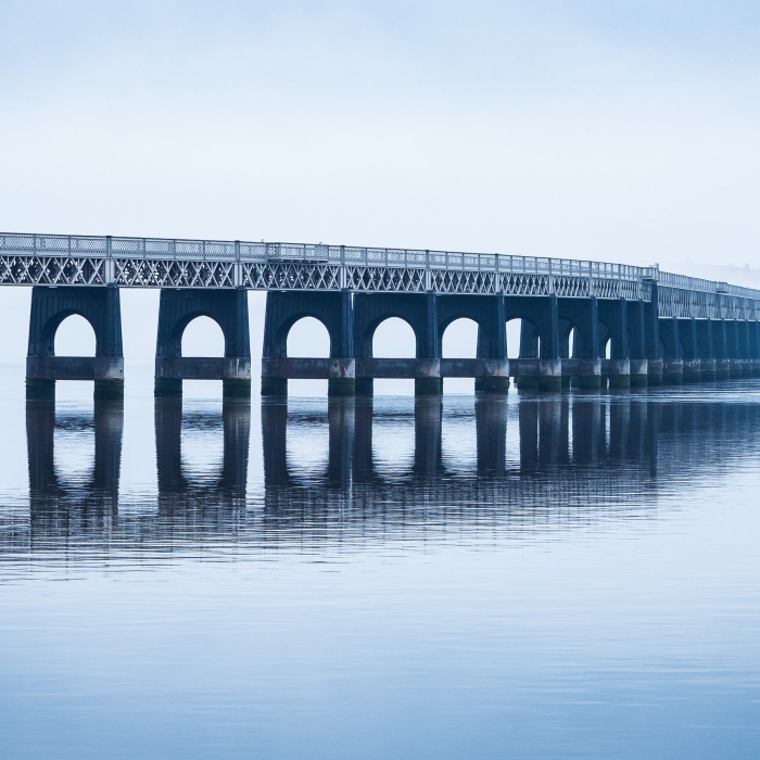 The Tay Railway Bridge in fog, from Dundee, Scotland.