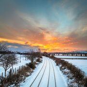 Winter sunrise over the Dundee to Perth railway line, Dundee, Scotland.  DD135