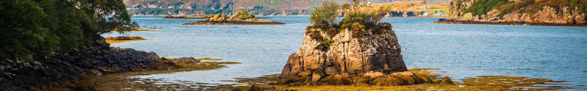 Rocky islet in Poll Domhain, Applecross, Scotland. AP021