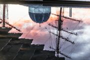 Reflections of the RRS Discovery, Discovery Centre and V&A Dundee in pool outside the V&A Dundee building.