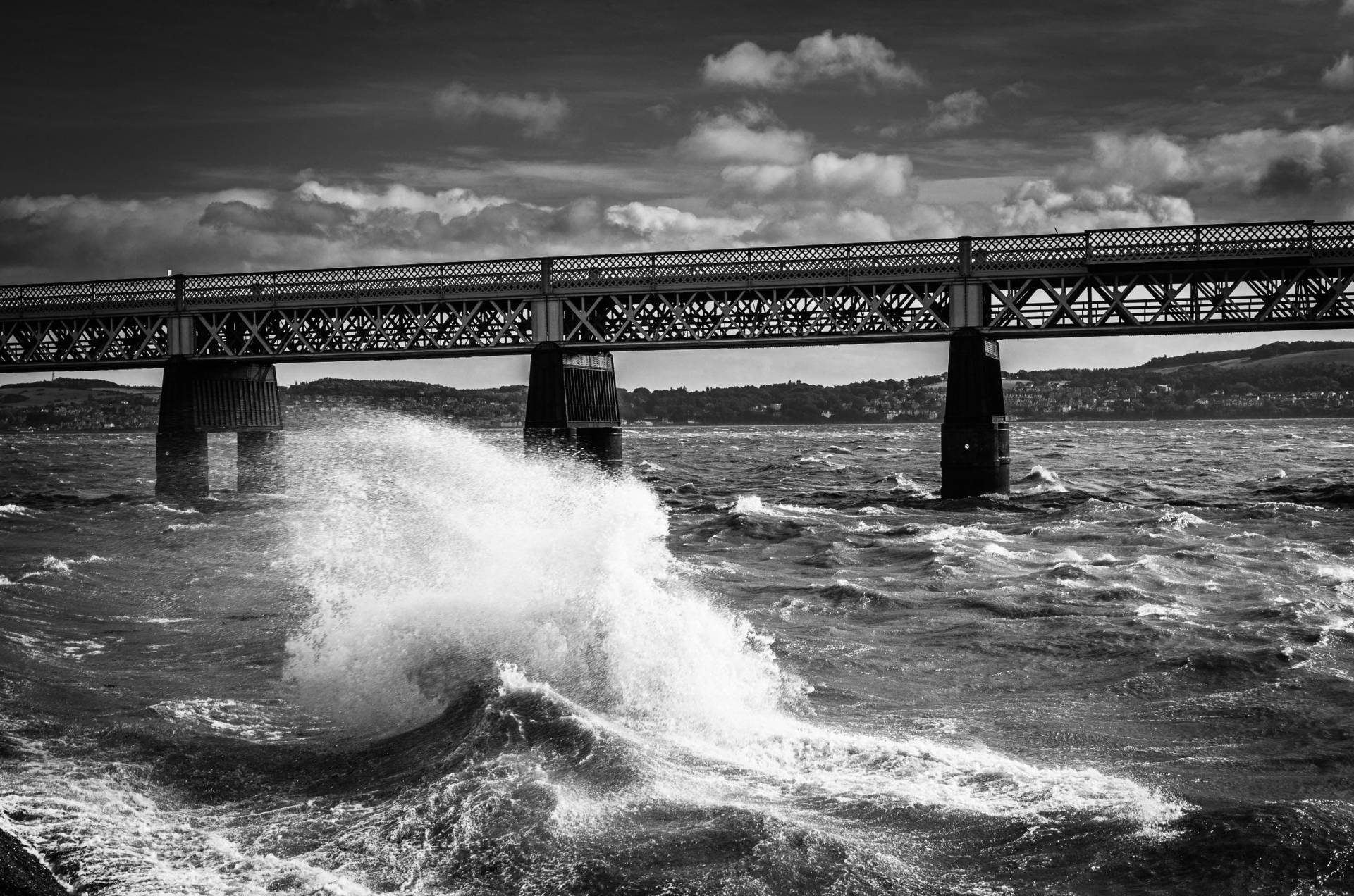 Monochrome (black and white) image of rough water on the Firth of Tay by the Tay Rail Bridge, Dundee, Scotland, United Kingdom. the Firth of Tay around the Tay Rail Bridge, Dundee, Scotland. DD027